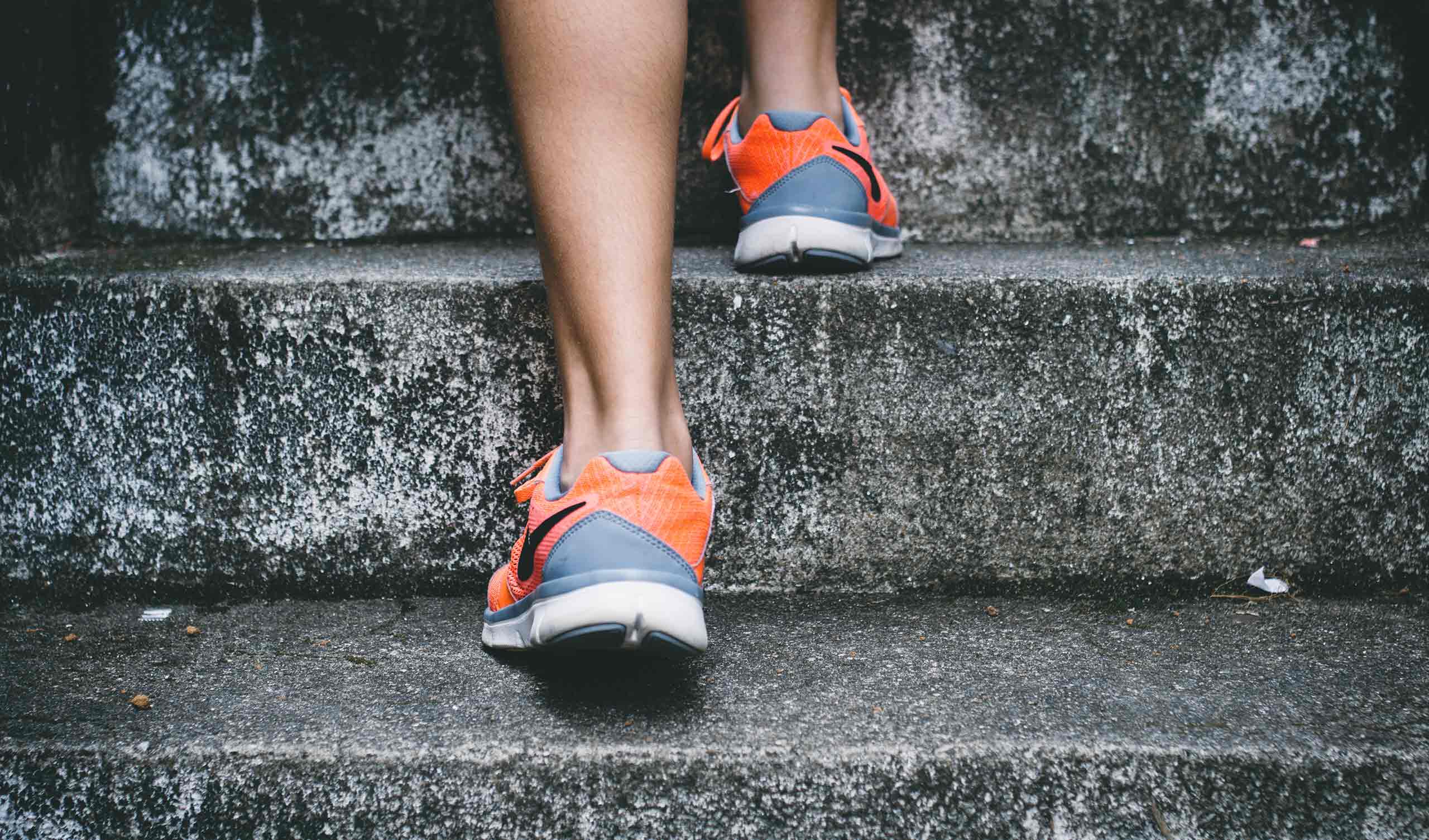 a person steps on concrete stairs