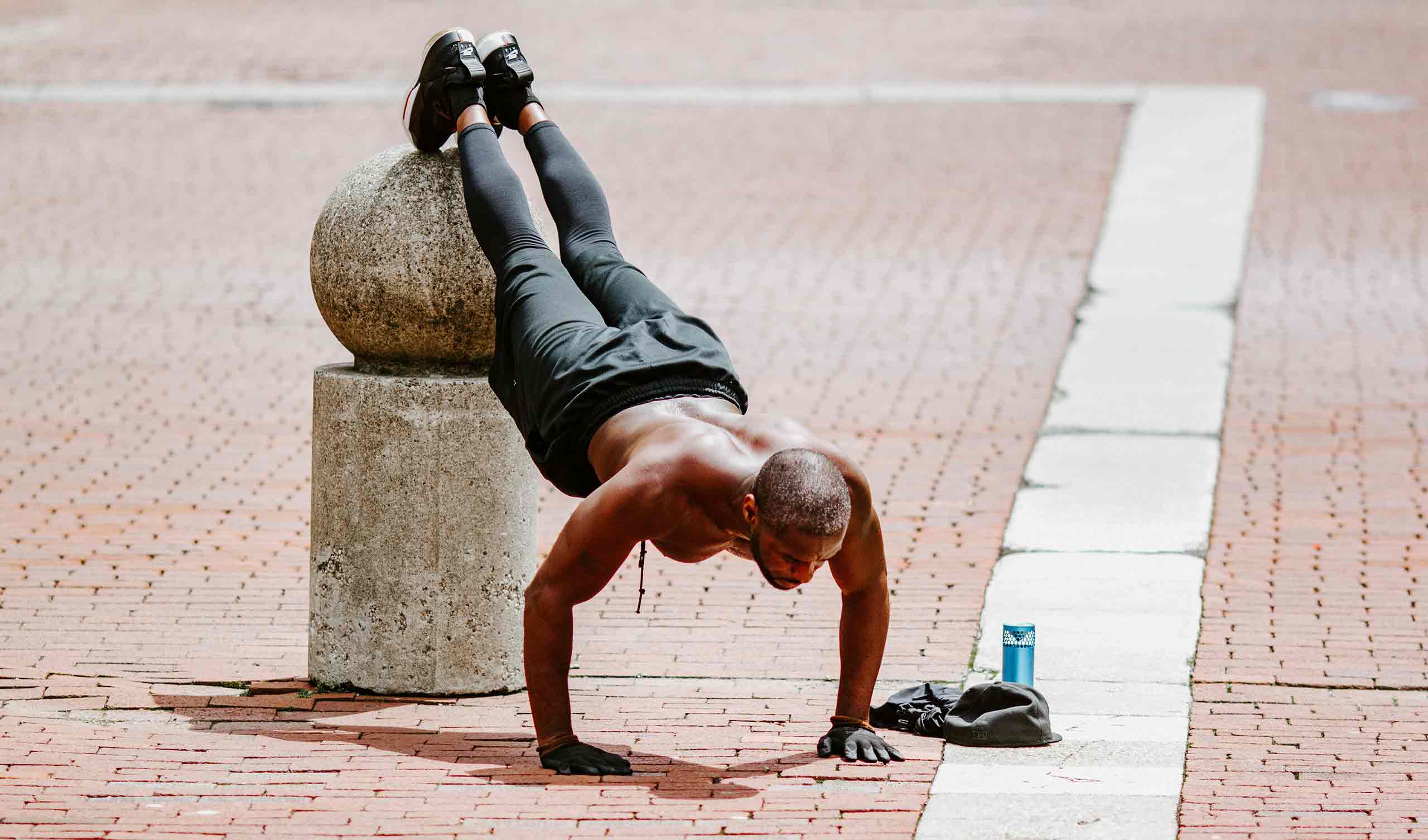 a person is doing push-ups outside