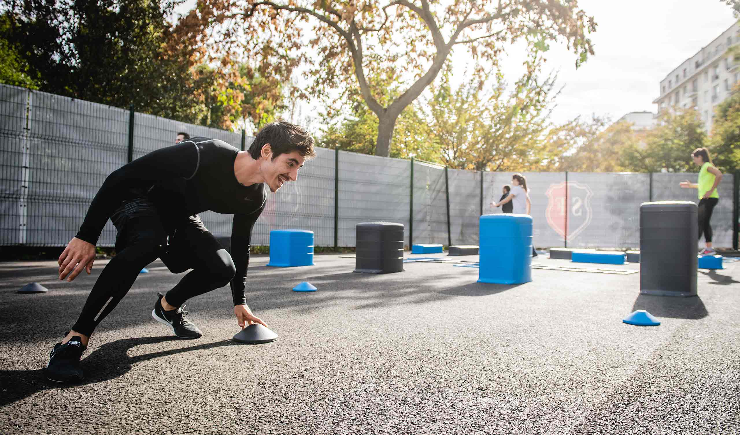 a person is exercising in an outdoor gym